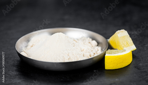 Lemon powder (fresh) as detailed close-up shot, selective focus)