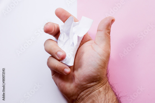 Man crumpling the piece of paper with hashtag: NOT AFRAID. do not be afraid of your desires.