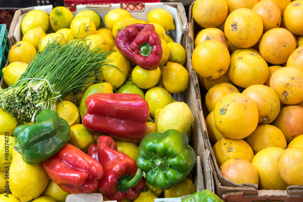 Lemons and bell pepper for sale at a market