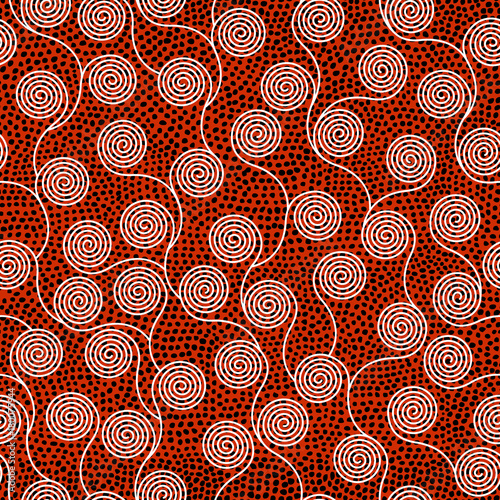 Ethnic boho seamless pattern in african style on black background. Tribal art print. Irregular polka dots pattern.