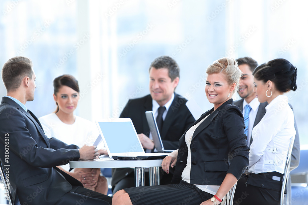 Business Team Discussing Ideas in Lounge Business Team Discussing Ideas in Lounge
