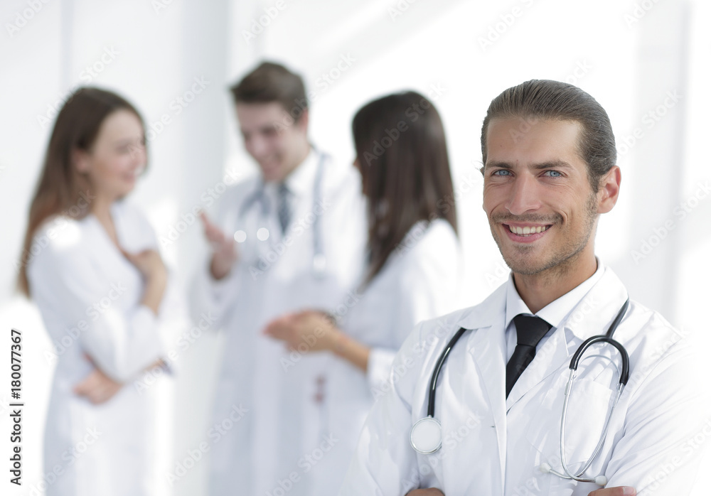 smiling doctor therapist on blurred background. smiling doctor therapist on blurred background.