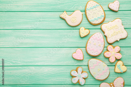 Easter cookies on mint wooden table