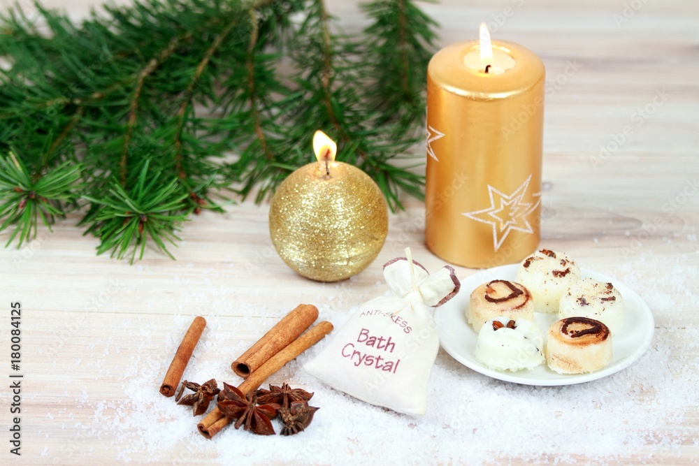 Winter spa concept, candles, body cream, bath Winter spa concept, candles, body cream, bath