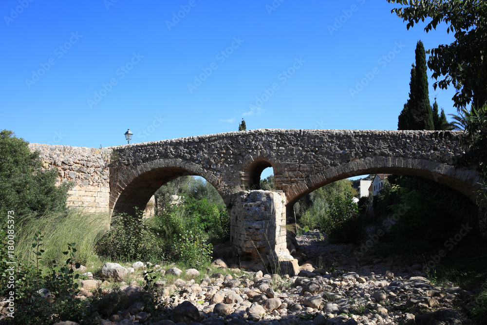 Old roman bridge at Pollensa. Mallorca. Spain