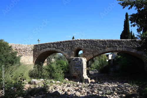Old roman bridge at Pollensa. Mallorca. Spain © Benshot