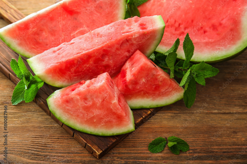 Tasty sliced watermelon on table