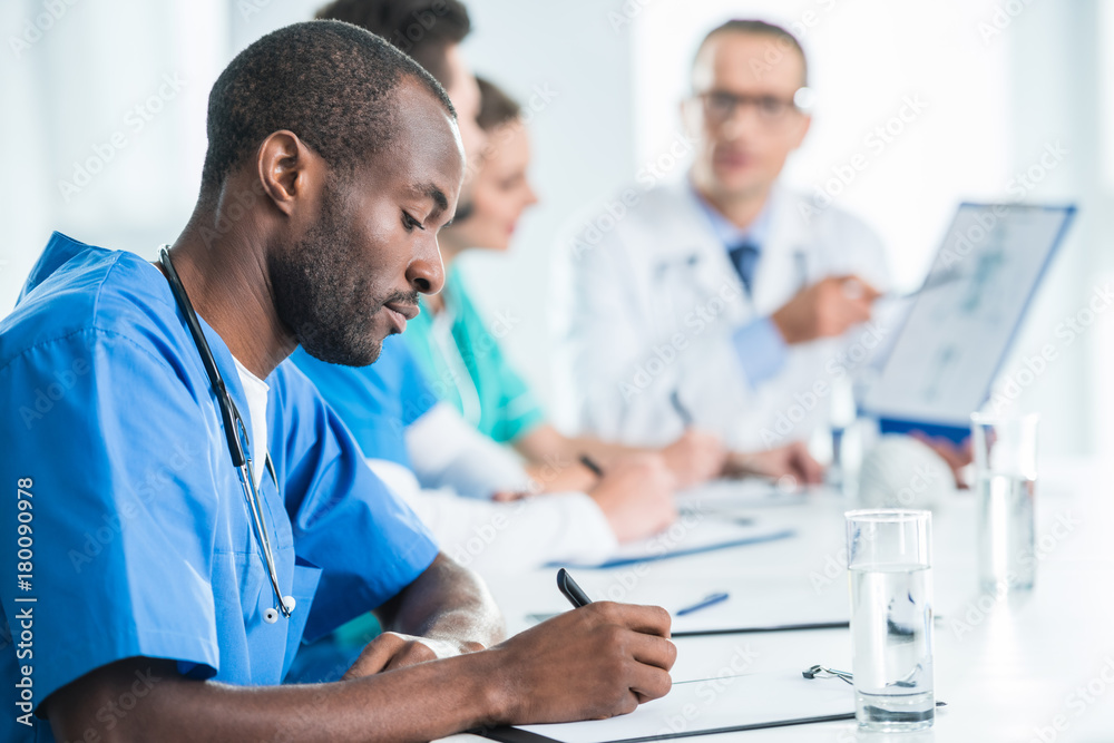 team of doctors having conversation team of doctors having conversation