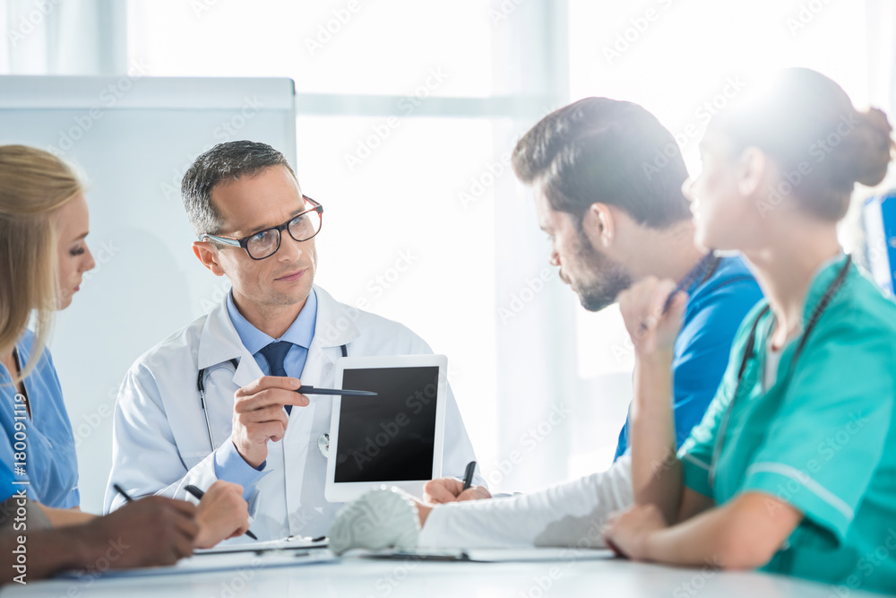 team of doctors having conversation team of doctors having conversation