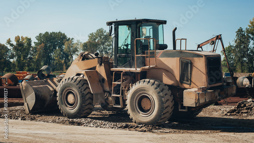 Old aged bagger at construction aggregate dumps