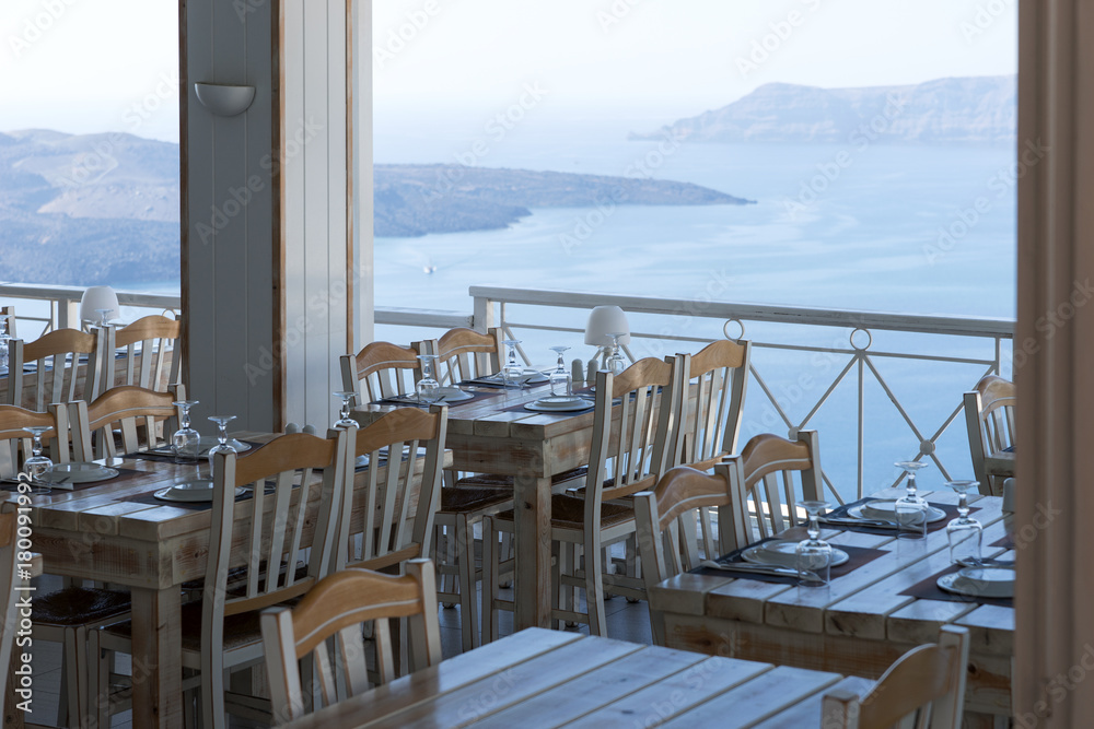 Empty restaurant with beautiful sea view in Fira, Santorini