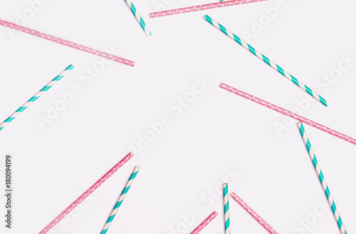 Paper straws background. Holiday and party concept. Toned image, flat lay