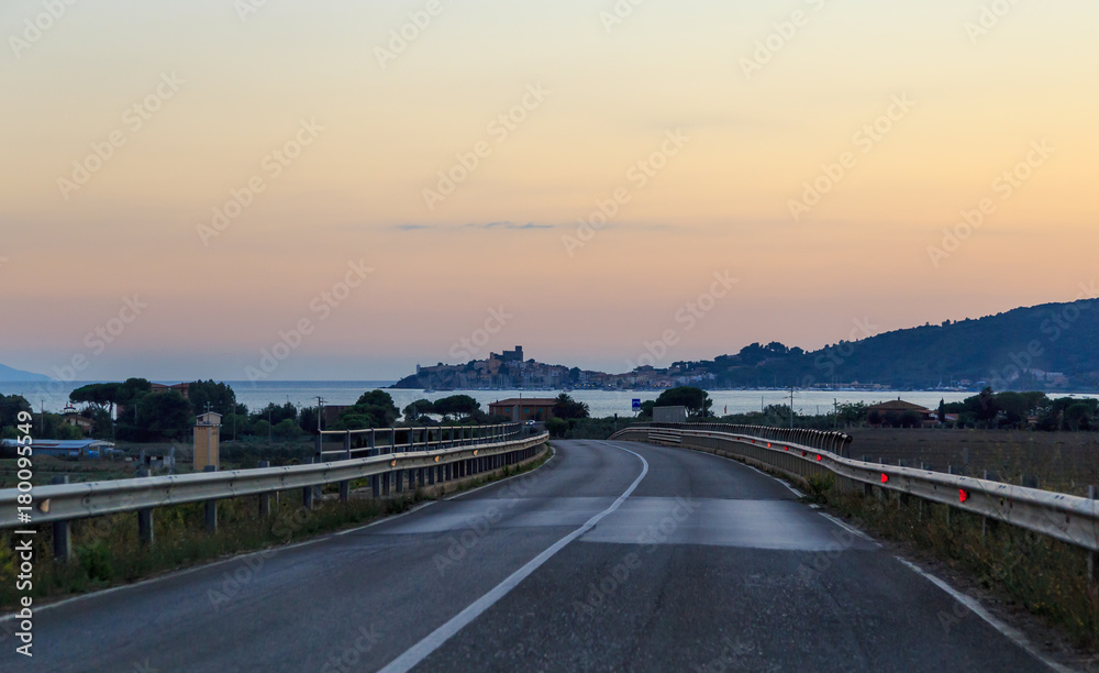 Italy, evening road in Talamone, Tuscany.