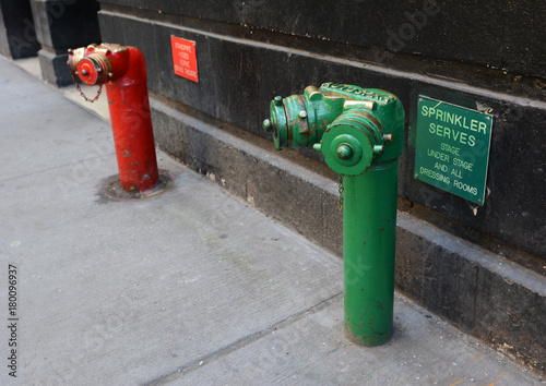 Red and green siamese standpipes photo