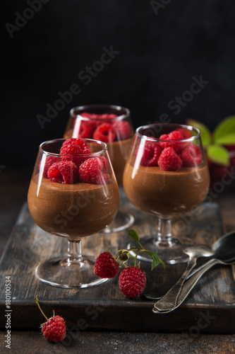 delicious chocolate mousse served with fresh raspberry