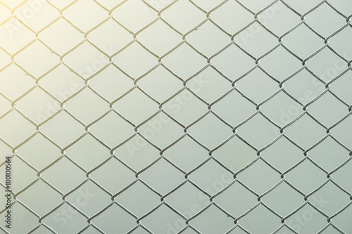 Metal wire fence protection chainlink background, Soft light concept