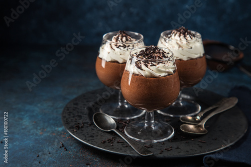 chocolate mousse served with whipped cream photo