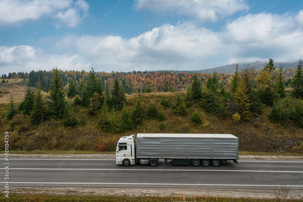 Truck on road at sunny day