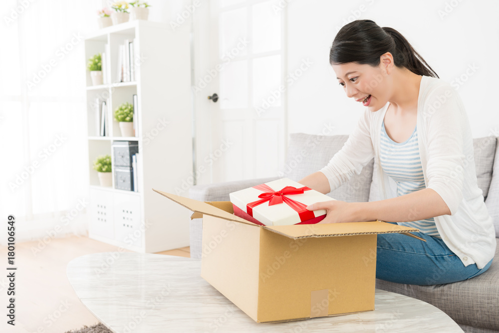 girl feeling happy when she opening parcel box girl feeling happy when she opening parcel box