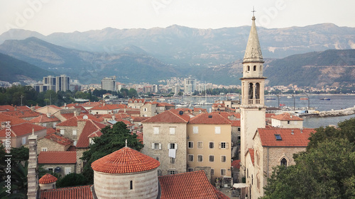 Travel around the cities of Montenegro.Red tiled roofs of the old city in budva