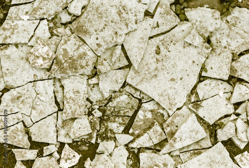 old plaster on the ground as an abstract background old plaster on the ground as an abstract background