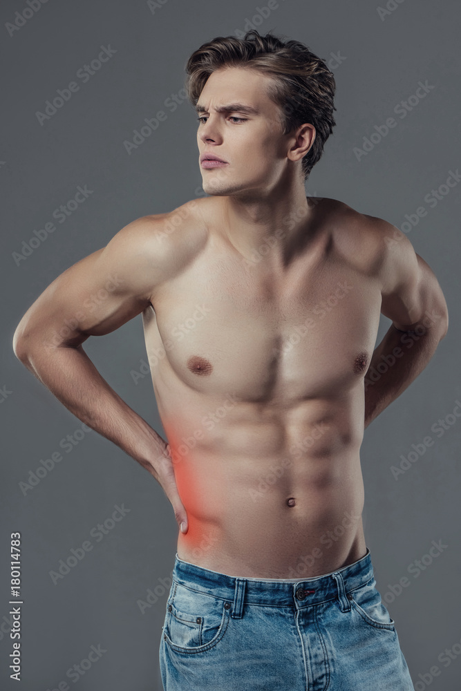 Handsome man on grey background Handsome man on grey background