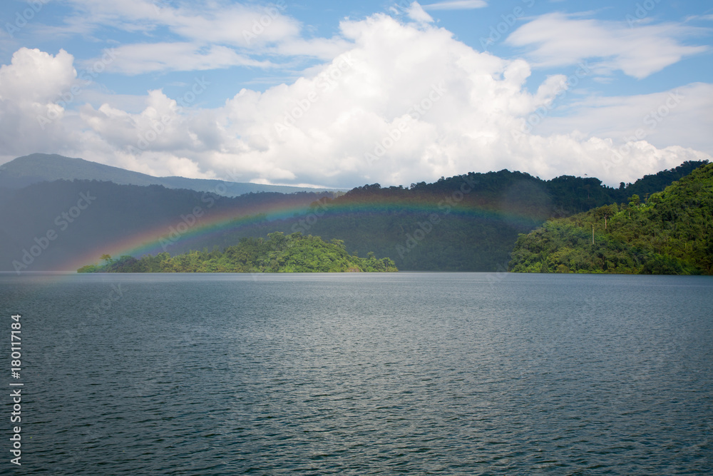 beautiful sky with Rainbow over mountain peak