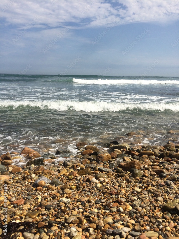 Rocky beach with incoming waves