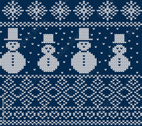 Knit christmas design with snowmen and snowflakes. Blue seamless background.
