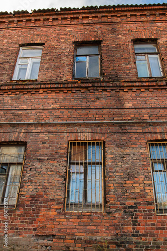 Facade of old red brick building in Vyborg  Russia
