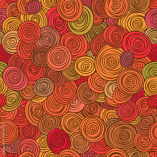 Seamless abstract red pattern of striped circles in circles.