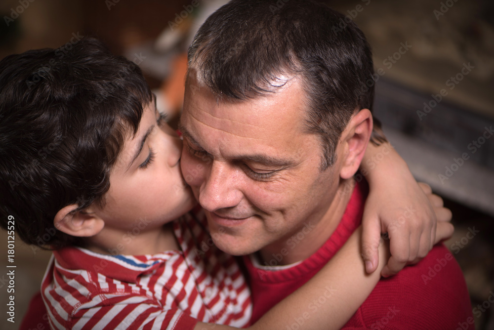 Close portrait of happy father and his adorable son Close portrait of happy father and his adorable son
