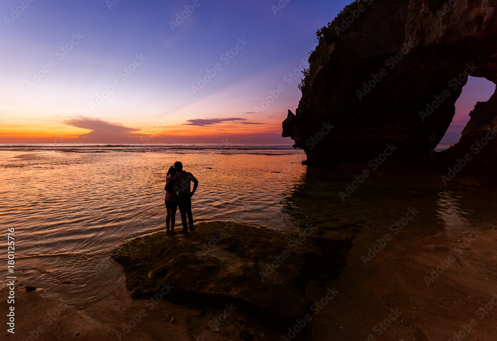 Couple in Suluban beach - Bali Indonesia Couple in Suluban beach - Bali Indonesia