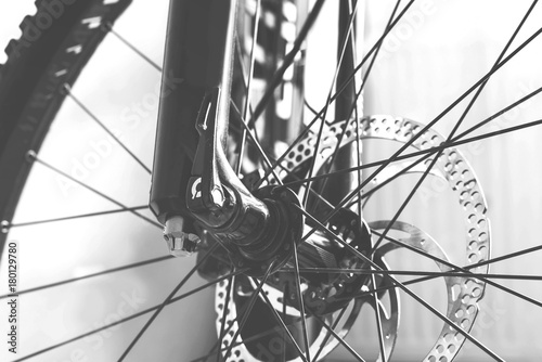 Bicycle details black and white frame, front wheel mountain bike