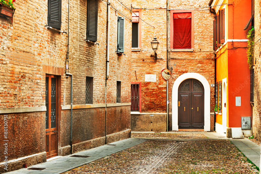 Ferrara, Italy - 22.06.2017:  The streets of the historic Italian city of Ferrara, typical Italian houses