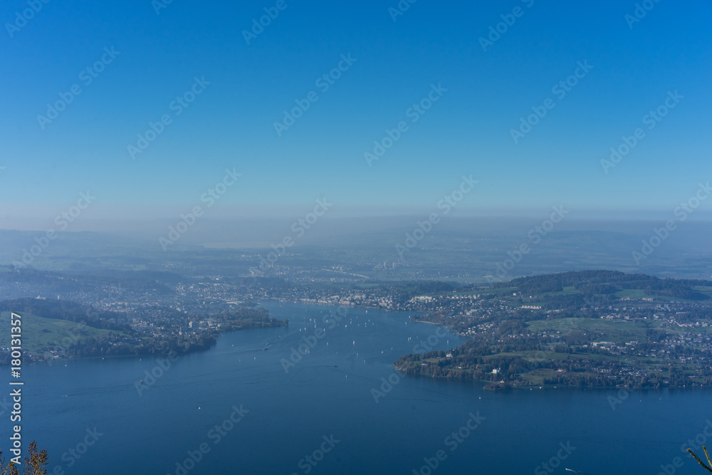 lake lucerne with mountain and fog close to sunset