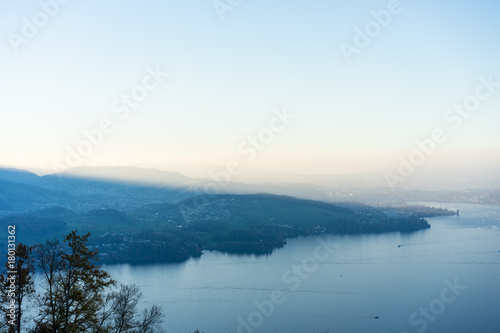 lake lucerne with mountain and fog close to sunset