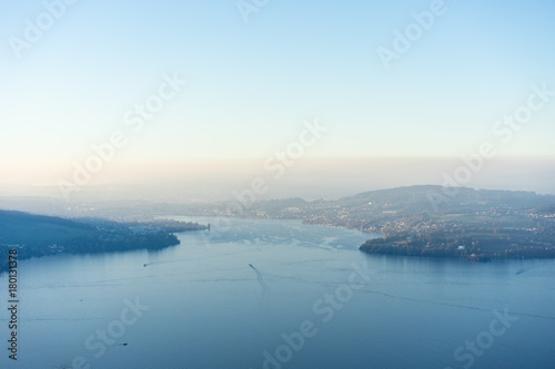 lake lucerne with mountain and fog close to sunset