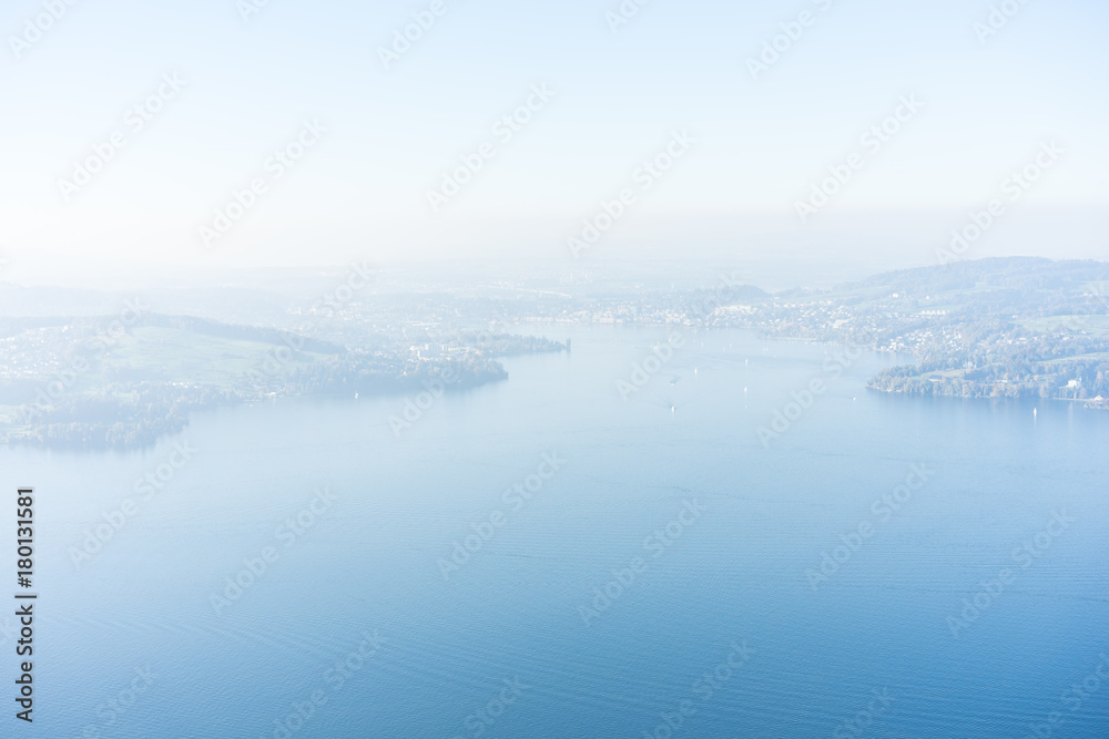 view of lake lucerne from buergenstock with fog