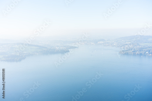 view of lake lucerne from buergenstock with fog