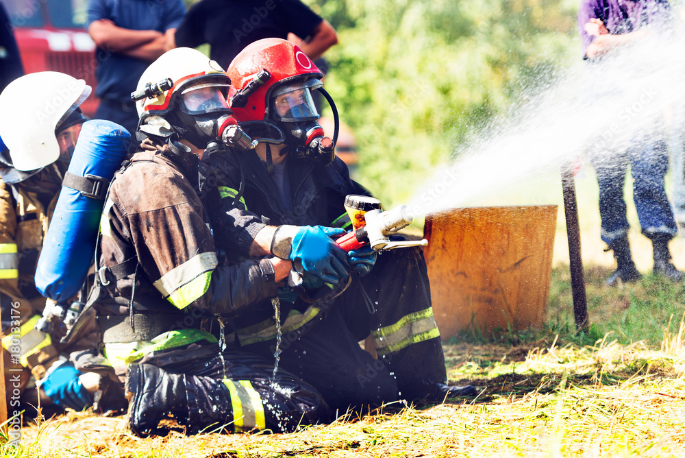 Fototapeta premium Lviv. Ukraine, August 31, 2017. Firefighters carry out training in oxygen vehicles