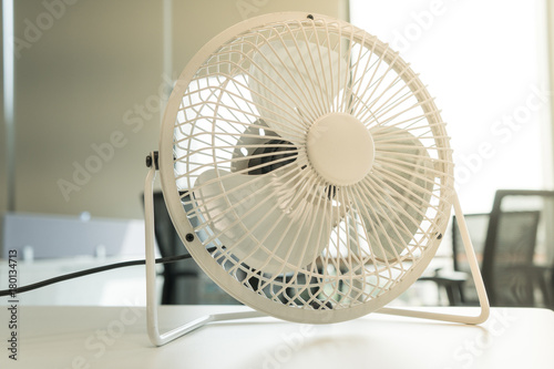 small white electric fan