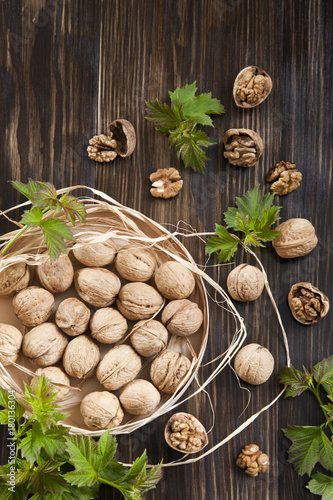 Walnuts on a vintage wooden background. Top view, background
