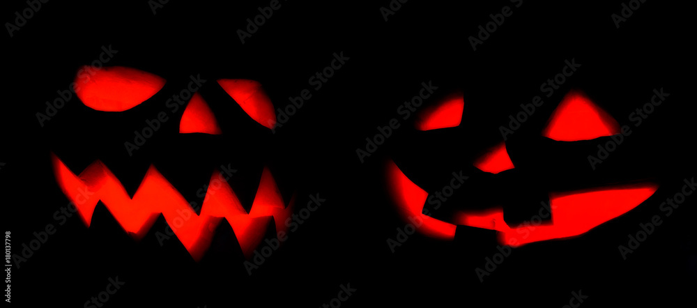 Naklejka premium Halloween pumpkin's grin on black isolated background