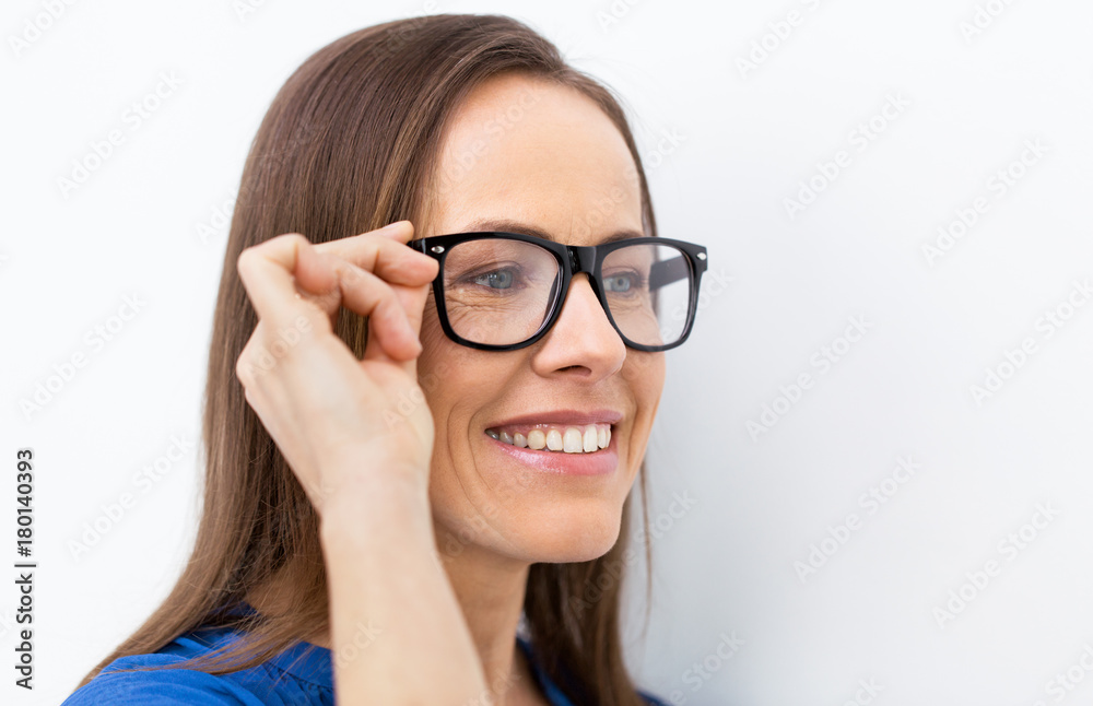 close up of smiling middle aged woman in glasses close up of smiling middle aged woman in glasses