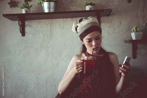 Asian hipster girl drink  lemontea iced in the coffee shop,time for relax,Lifestyle of single woman photo