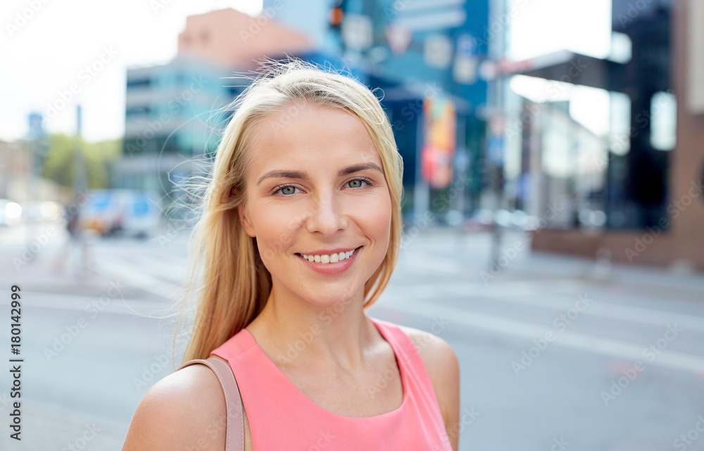 happy smiling young woman on city street happy smiling young woman on city street