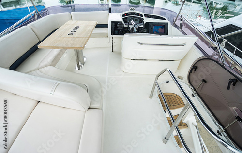 Interior of luxury modern yacht with driving place. © upslim