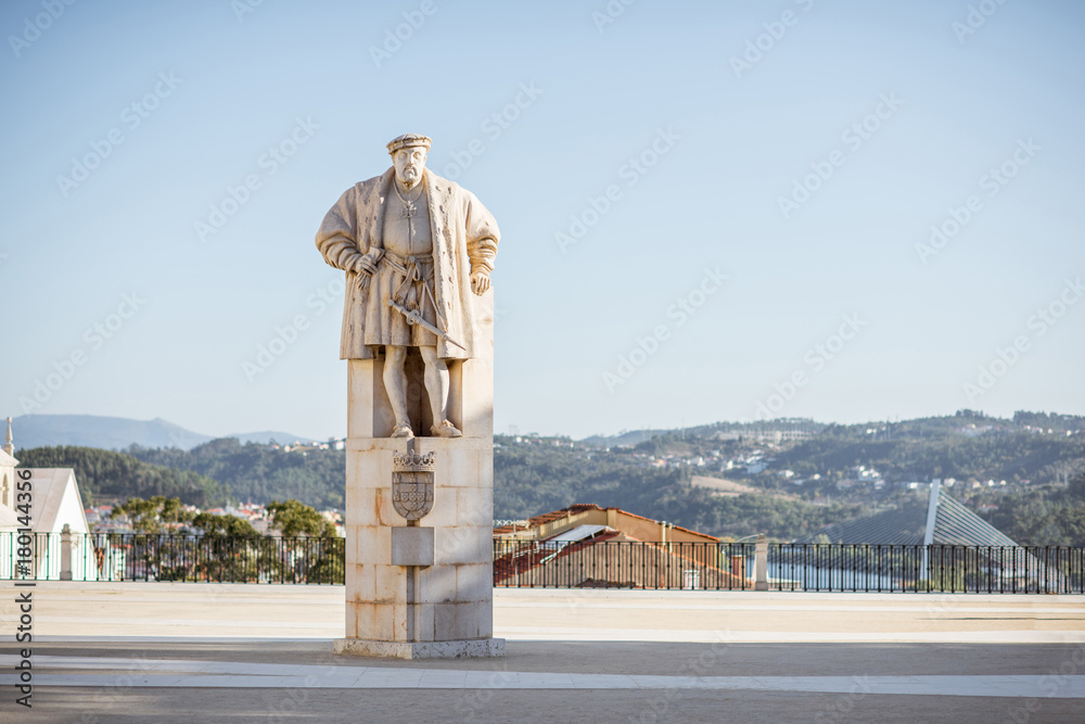 View on the Jean statue at the courtyard of the old university in Coimbra city in the central Portugal