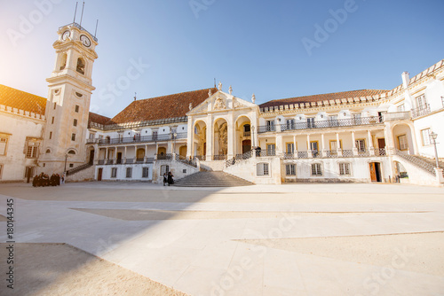 View on the courtyard of the old university with university tower in Coimbra city during the sunset in the central Portugal